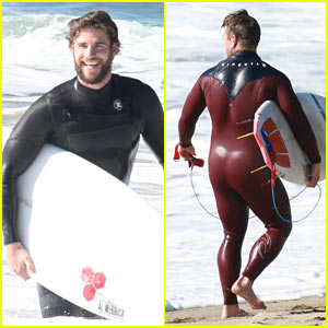 Liam Hemsworth Hits the Waves in Malibu With Brother Luke