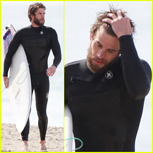 Liam Hemsworth Dreamily Runs His Hand Through His Hair at the Beach