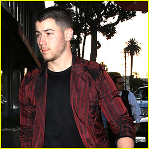 Nick Jonas Wears Striped Blazer For Dinner At Craigs