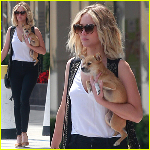 Jennifer Lawrence Cuddles Her Pup While Out & About in Westwood