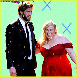 It IS Romantic! Liam Hemsworth Gives Rebel Wilson a Kiss in the Rain!