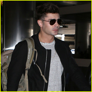 Zac Efron Carries His Own Bags at LAX