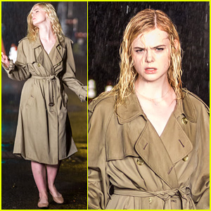 Elle Fanning Sports a Trench Coat in the Rain on Woody Allen Film Set