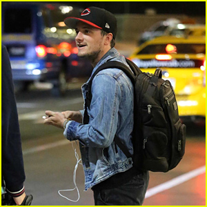 Josh Hutcherson Is in Good Spirits While Wearing a Leg Brace at the Airport