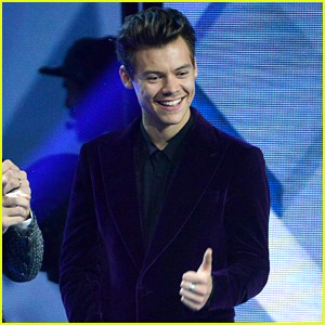 Harry Styles Flashes a Grin During 'X Factor' Italy Performance (Video)
