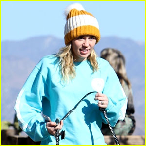 Miley Cyrus Rocks Cute Pom-Pom Beanie While Walking Her Dog