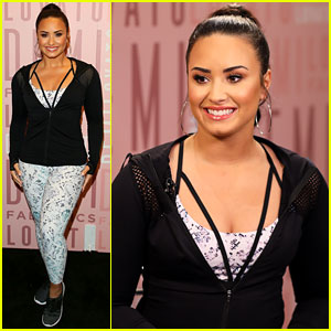 Demi Lovato Shoots Fabletics Commercial in Purple Workout Gear and