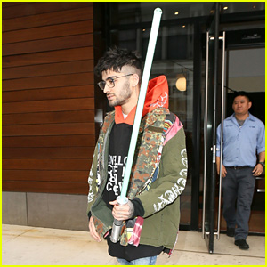 Zayn Malik Carries a Lightsaber Out of the Studio!