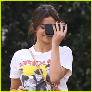 Selena Gomez Hides Behind Her Phone While Out in LA