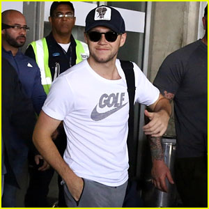 Niall Horan Greets Fans After Landing at Rio de Janeiro Airport!