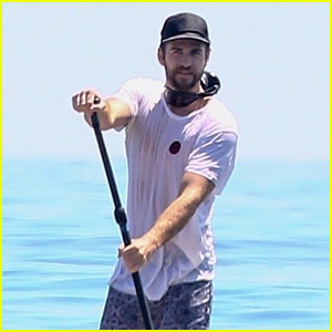 Liam Hemsworth Soaks Up the Sun While Paddle Boarding