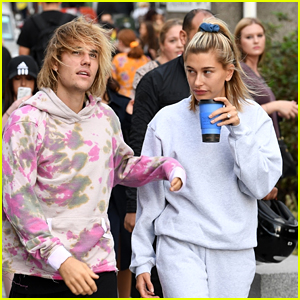 Engaged Couple Justin Bieber & Hailey Baldwin Share a Smooch While in Line for the London Eye!