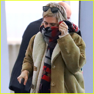 Cara Delevingne Keeps a Low Profile for Christmas Eve Flight