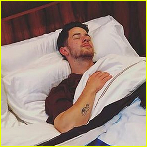 Nick Jonas Continues Trolling John Stamos With Hilarious Blanket