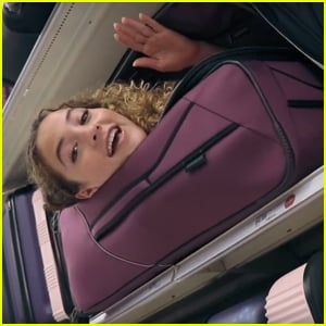 Sofie Dossi Squeezes Into a Suitcase in Public!