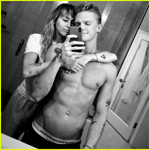 Miley Cyrus & Shirtless Cody Simpson Get Cozy in New Photo!