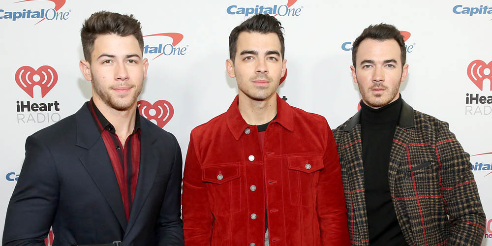 Jonas Brothers Wear Santa Hats For Their Jingle Ball 2019 Performance in NYC