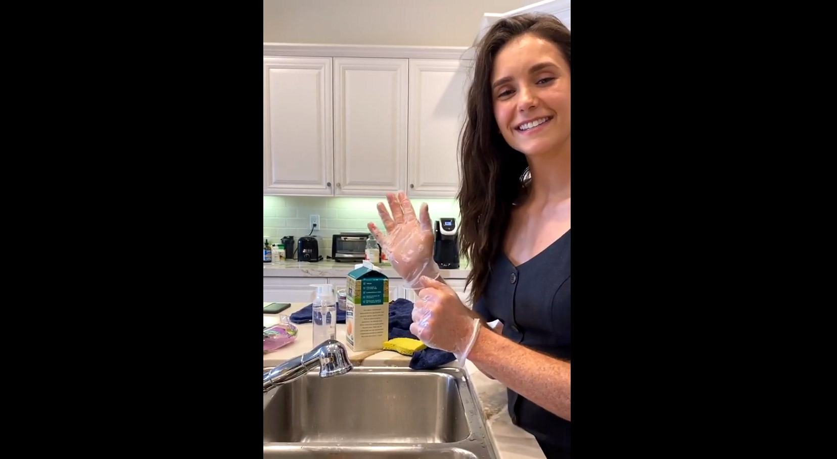 Nina Dobrev Uses Her Rumored Boyfriend Shaun White’s Hands to Wash Groceries!