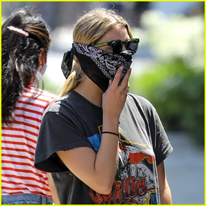 Ashley Benson Wears a Bandana Mask While Picking Up Food To Go in LA