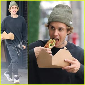 Justin Bieber Eats Avocado Toast While Walking Down the Sidewalk