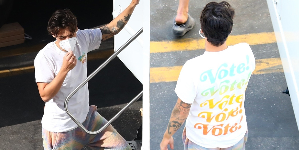Harry Styles Wears a ‘VOTE’ Shirt on ‘Don’t Worry Darling’ Set (Photos)