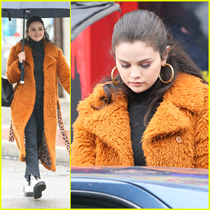 Selena Gomez Keeps Warm From Chilly Weather In Fuzziest Orange Coat on 'Only Murders' Set