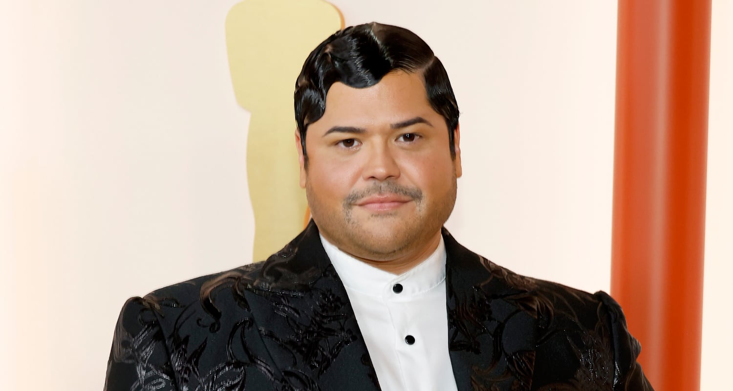 Harvey Guillen Twirls on the Carpet at the Oscars 2023
