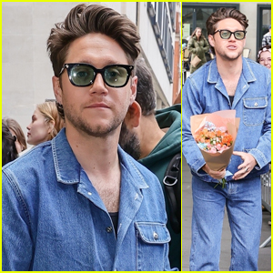 Niall Horan Rocks Double Denim & Accepts Flowers From a Fan Ahead of the Release of His New Single 'Meltdown'