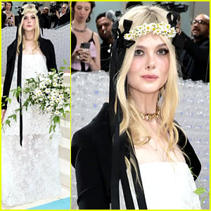 Elle Fanning Wears a Daisy Crown In Honor of Karl Lagerfled at the Met Gala 2023