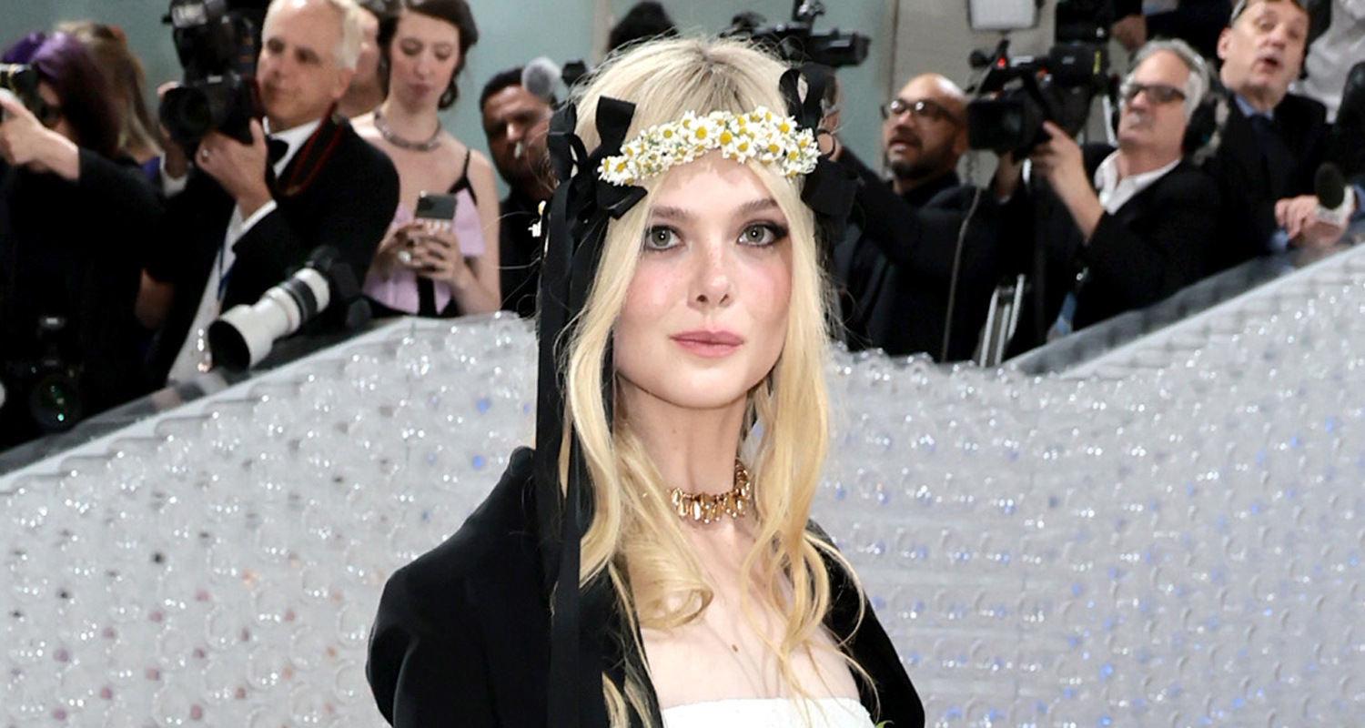 Elle Fanning Wears a Daisy Crown In Honor of Karl Lagerfled at the Met